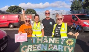 Members of Thanet Green Party, including Councillor Becky Wing, with placard and banner